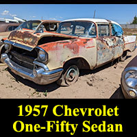 1957 Chevrolet 150 sedan in junkyard
