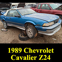 1989 Chevrolet Cavalier Z24 convertible in junkyard