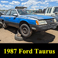 1987 Ford Taurus in junkyard
